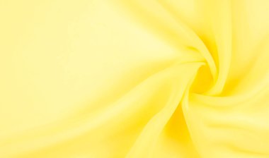 arkaplansız doku - sarı ipek. Soluk sarı renkli birinci sınıf ipek organza fevkalade bir kumaştır, hem kendi başına güzeldir hem de vurgu açısından bir aksesuardır..