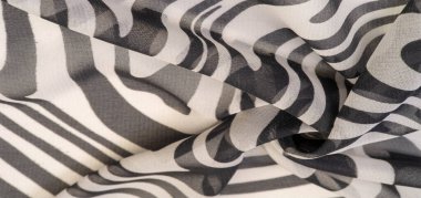 İpek kumaş, siyah beyaz soyut çizgiler. Soyut siyah beyaz desenli büyülü bir şekil. Retro modern dekor, tekstil sanatı, tasarım, doku, arkaplan, kalıp