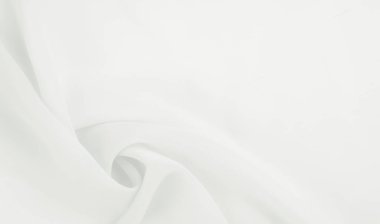 Kusursuz arkaplan dokusu - beyaz ipek. Bu antika beyaz ipek kumaşla klasik bir estetik elde et. Elinde pürüzsüz ve çıtır çıtır, zengin fildişi rengi göz kamaştırıcı bir parıltı yaratır..