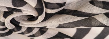 İpek kumaş, siyah beyaz soyut çizgiler. Soyut siyah beyaz desenli büyülü bir şekil. Retro modern dekor, tekstil sanatı, tasarım, doku, arkaplan, kalıp