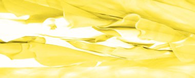 Kusursuz kaleydoskop, sarı ipek. Şık bir sunum için ihtiyacın olan tek şey güneşli sarı ipek bir musluk..