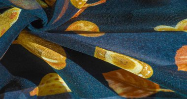 İpek kumaş, mavi ve sarı sonbahar yaprakları. Doku, arkaplan deseni