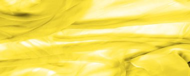 Kusursuz kaleydoskop, sarı ipek. Şık bir sunum için ihtiyacın olan tek şey güneşli sarı ipek bir musluk..