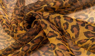 İpek kumaş, leopar derisi, kahverengi-sarı siyah tonlar, projeleriniz için sıcak Afrika safarisi, doku arka planı, desen