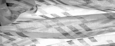 Siyah geometrik eşkenar dörtgen şekilli beyaz ipek kumaş. Karanlık. Geçmişi. Şablon.