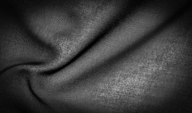 Koyu siyah şifon ipeği, bükülmüş iplik kullanımı nedeniyle hafif pürüzlü (matte, creped) yumuşak şeffaf bir kumaştır. Arkaplan dokusu