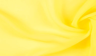 arkaplansız doku - sarı ipek. Soluk sarı renkli birinci sınıf ipek organza fevkalade bir kumaştır, hem kendi başına güzeldir hem de vurgu açısından bir aksesuardır..