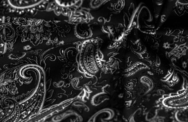 Siyah arka planda desenli siyah beyaz desen. Kovboyların ve motorcuların bandanalarını dekore etti. Beatles tarafından popüler hale getirildi, rock 'n roll çağına öncülük etti..