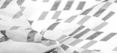 Siyah geometrik eşkenar dörtgen şekilli beyaz ipek kumaş. Karanlık. Geçmişi. Şablon.