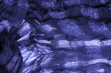 Doku. Koyu mavi kumaş. Noel kadınsı kraliyet partisi için dekoratif bir altyapı. Şatafatlı, deri desenli duvar kağıdı desenli. Doğum günü davetiyeleri için arka plan. Açık pastel renk