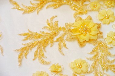 Kartpostallar için altın sarısı dantel arka plan. Posterler. Dokular. Eski dantel çizgileri projelerinize kaliteli doku örnekleri ve çeşitli yaratıcı projeler ekler ekler.