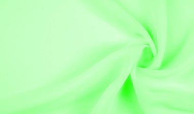 Doku - soluk yeşil ipek. Bu kumaşı herhangi bir mevsim için sıradan bir görünüme dönüştürebilirsin. Yumuşak siluetlere kolayca akabilen esnek, akışkan kumaşlar her şeyi yaratmanızı sağlar..