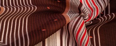 İpek kumaş, kahverengi arkaplan çizgili beyaz ve kırmızı çizgiler, İspanyol teması, doku, desen, koleksiyon