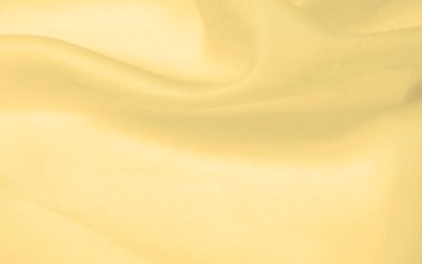 Bulanık sarı ipek kumaş. Kremsi bej rengini ve ışıldayan saten kaplamasını gösteriyor. Hala şifonun ve akıcı kumaşın tipik tazeliğini koruyor..
