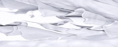 Kusursuz kaleydoskop. Kumaş ipeksi beyaz ve gri. Bu şifonda ultra modern bir baskı ve hassas, havadar bir kalite soyut ipek baskı ile birleştirilmiş..