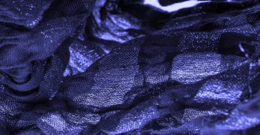 Doku. Koyu mavi kumaş. Noel kadınsı kraliyet partisi için dekoratif bir altyapı. Şatafatlı, deri desenli duvar kağıdı desenli. Doğum günü davetiyeleri için arka plan. Açık pastel renk