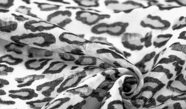 İpek kumaştan siyah beyaz leopar desenli. Leopar desenli hafif ipek senin tasarımına mükemmel uyacak, şık görünüyor ve kaba değil! Doku, arkaplan, desen