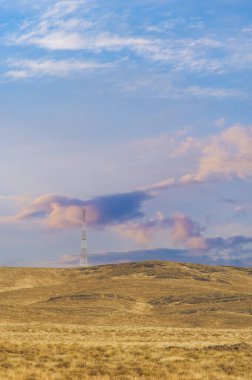 Steppe, prairie, plain, pampa. A mesmerizing spectacle unfolds as the sun's radiant glow cascades across the vast prairie, enlightening our souls. Sunset Splendor clipart