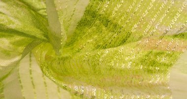 ipek kumaş, yeşil-kahverengi, soyut arka plan kumaşı veya sıvı dalga veya grunge ipek kumaş kıvrımlı kadife kumaş veya lüks Noel arkaplanı veya zarif duvar kağıdı tasarımı