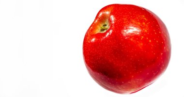 Beyaz arka planda elma. Pectin, quercetin, prosiyanidin ve C vitamini içerirler. Bunlar kanser ve hastalıkların önlenmesinde faydalıdır..