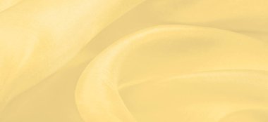 Bulanık sarı ipek kumaş. Olağanüstü bir proje için ihtiyacınız olan tek şey güneşli sarı ipek bir musluktur. Çoğu periden daha ince ve hafiftir. Görünüşü tamamlayan sert bir perdesi vardır..