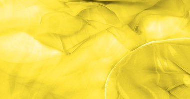 Kusursuz kaleydoskop, sarı ipek. Şık bir sunum için ihtiyacın olan tek şey güneşli sarı ipek bir musluk..