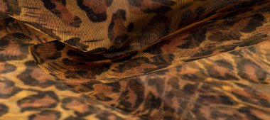 İpek kumaş, leopar derisi, kahverengi-sarı siyah tonlar, projeleriniz için sıcak Afrika safarisi, doku arka planı, desen