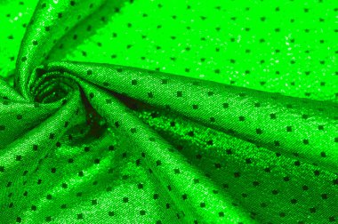Küçük puantiyeli metalik parıltılı kumaş. Yeşil renk, çarpıcı bir metalik kumaş tasarımı ile bir sonraki etkinliğinizin ilgi odağı olacak. İnanılmaz pürüzsüz ve canlı bir parıltı sunacak.
