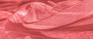 İpek kumaş. Kırmızı kırışık kumaş dokusu. Kırmızı buruşuk peri dokusu dalgalı yüzey, yakın plan., 