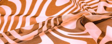 İpek kumaş, kahverengi ve beyaz soyut çizgiler. Soyut kahverengi ve beyaz desenlerin sihirli şekli. Retro modern dekor, tekstil sanatı, tasarım, doku, 