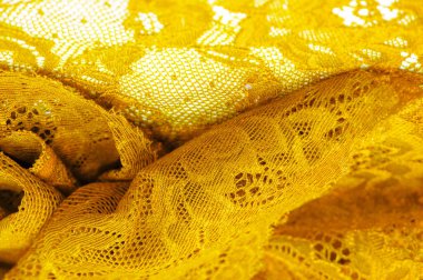 Moda ve dekoratif sarı iç çamaşırı danteli elastik bir bant ya da ev dekorasyonu olarak kullanılabilir. Tasarımlara, arka planlara ve desenlere doku ekler.