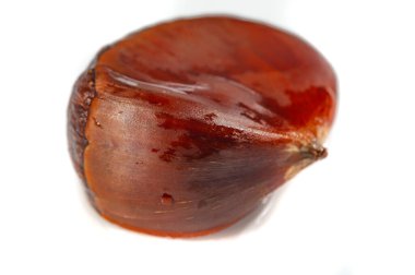 Kestane ağacının bu nefes kesici yakın çekimi ile basitliğin özünü keşfedin, minimalist ve dramatik bir ortamda doğanın tasarımının güzelliğini gösterin. Beslenme Temelleri