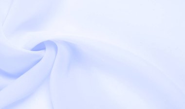 Kusursuz arkaplan dokusu - soluk mavi ipek. Bu basit ama sofistike kumaşın nüanslarının kendi adına konuşmasına izin ver. Yumuşak, kumlu doku, hafif parlak mavi renk.