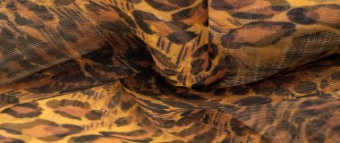 İpek kumaş, leopar derisi, kahverengi-sarı siyah tonlar, projeleriniz için sıcak Afrika safarisi, doku arka planı, desen