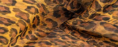İpek kumaş, leopar derisi, kahverengi-sarı siyah tonlar, projeleriniz için sıcak Afrika safarisi, doku arka planı, desen