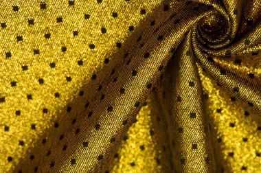 Brocade altın rengidir. Küçük bir polka şeklinde. Brocade genellikle altın ve gümüş ipliklerle renklendirilmiş ipekten yapılan süslü bir mekik kumaşıdır. Rönesans 'ta önemli bir kumaş.