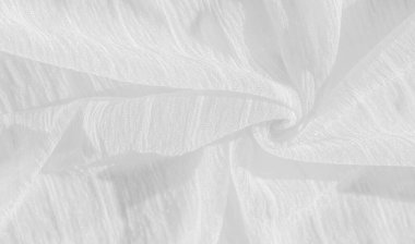 İpek kumaş. Beyaz buruşuk kumaşın dokusu. Beyaz buruşuk, dalgalı yüzey dokusu. Yakın çekim, yumuşak odaklanma. arkaplan, kalıp