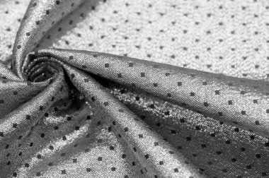 Küçük puantiyeli metalik parıltılı kumaş. Siyah. Bazen bir kumaş eklemeniz gerekir, bizim ipeklerimiz gibi..