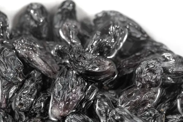 Kara kuru üzüm çeşitli yemeklerde çok yönlü bir malzemedir. Bu kiler zımbası ile yeni mutfak maceraları keşfedin. Tariflerinize siyah kuru üzümlerle derinlik ve tatlılık ekleyin.