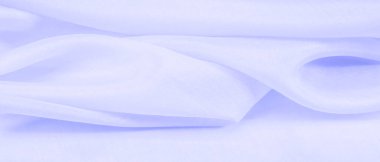 Bulanık mavi ipek kumaş. Dokularla dolu, hoş ve kaba bir el, kendi görsel tahıllarıyla birleştirilmiş. Lüks ve basit malzemeler, büyük projeleriniz için mükemmel bir seçim.