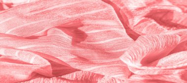 İpek kumaş. Kırmızı kırışık kumaş dokusu. Kırmızı buruşuk peri dokusu dalgalı yüzey, yakın plan., 