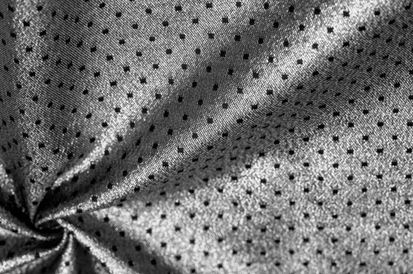 Brocade altın rengidir. Küçük bir polka şeklinde. Brocade genellikle altın ve gümüş ipliklerle renklendirilmiş ipekten yapılan süslü bir mekik kumaşıdır. Rönesans 'ta önemli bir kumaş.