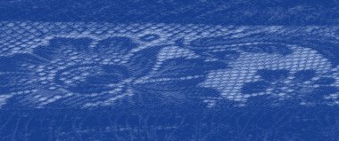 Dalgalı mavi dantelli, karmaşık dokuma desenleri olan, yumuşak ışık ve doku yakalayan, zarif tekstil ya da moda tasarımı için mükemmel..