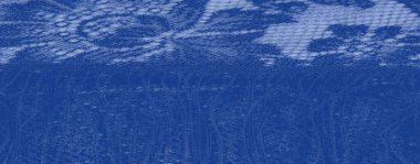 Karmaşık desenleri ve dokulu detaylarıyla narin mavi dantel kumaş bulanıklığı yumuşak ve zarif bir görünüm yaratıyor. Sanatsal veya tekstil ile ilgili tasarımlar için mükemmel.