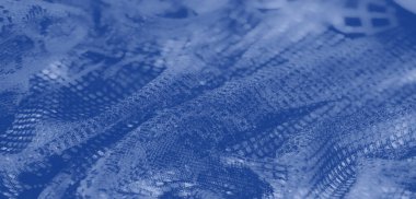 Işıldayan mavi dantel kumaş dokuma desenli ve akıcı, narin estetik, üst düzey moda ya da iç mekan uygulamaları için mükemmel..
