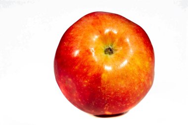 C vitamini için sulu elmanın tadını çıkarın. Arkanıza yaslanın ve elmanın parlak ve canlı renklerinin tadını çıkarın. Bu renkli meyvelerle sağlıklı beslenme kavramını benimse..