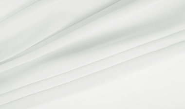 Doku - beyaz ipek. Bu antika beyaz ipek kumaşla klasik bir estetik elde et. Elinde pürüzsüz ve çıtır çıtır, zengin fildişi rengi göz kamaştırıcı bir parıltı yaratır..