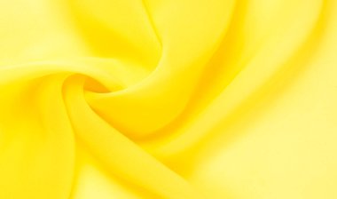arkaplansız doku - sarı ipek. Soluk sarı renkli birinci sınıf ipek organza fevkalade bir kumaştır, hem kendi başına güzeldir hem de vurgu açısından bir aksesuardır..