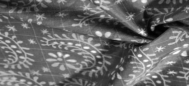 Çiçek desenli siyah ipek kumaş, çok yumuşak, çok yönlü. Tasarımlar, projeler ve daha fazlası için mükemmel. Arkaplan dokusu,
