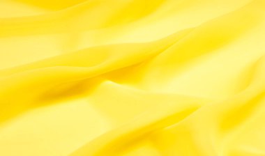 arkaplansız doku - sarı ipek. Soluk sarı renkli birinci sınıf ipek organza fevkalade bir kumaştır, hem kendi başına güzeldir hem de vurgu açısından bir aksesuardır..